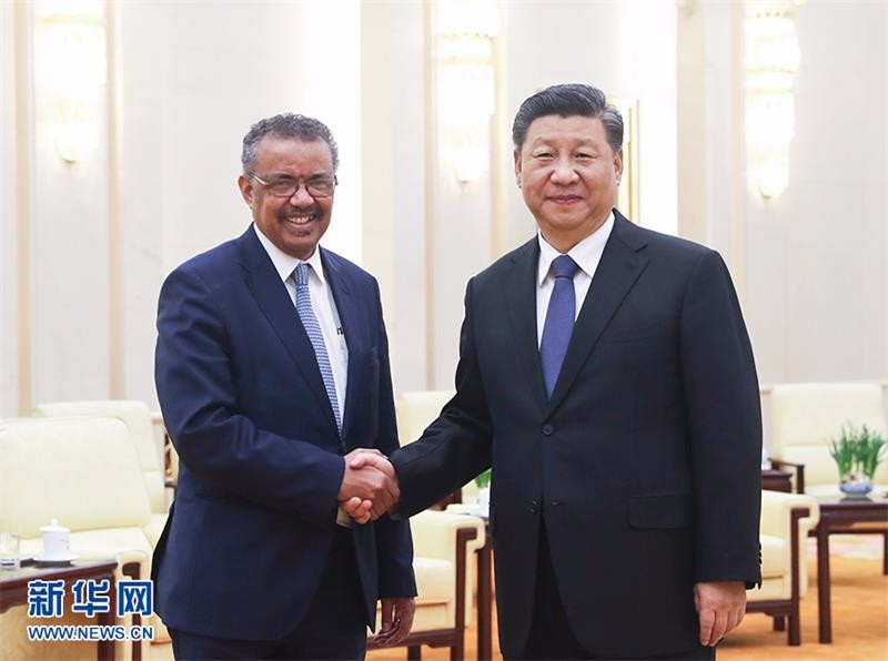 习近平会见世界卫生组织总干事谭德塞